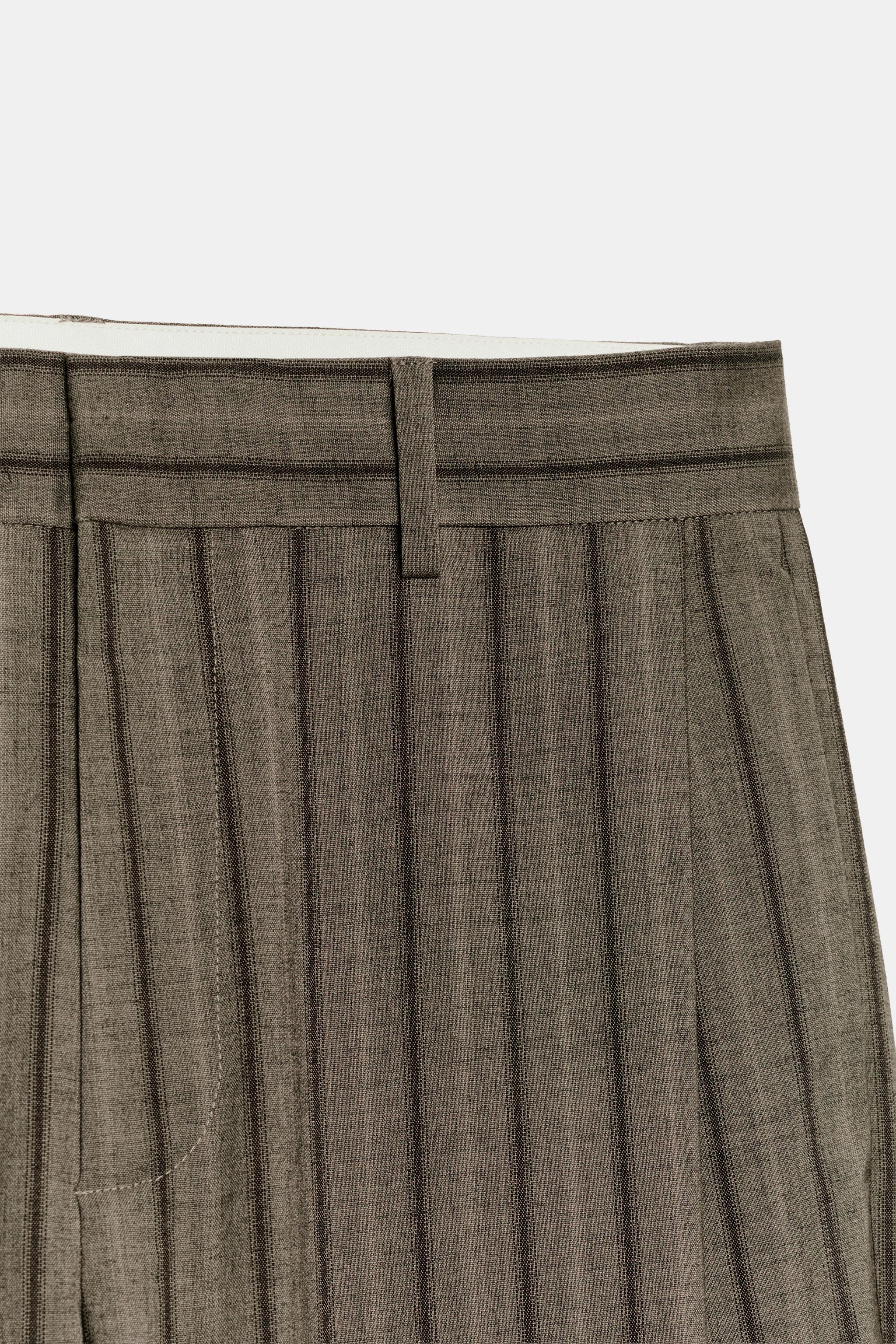 PANTALON À PLIS RAYURES